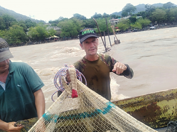 El r&iacute;o, el pescado y el pescador